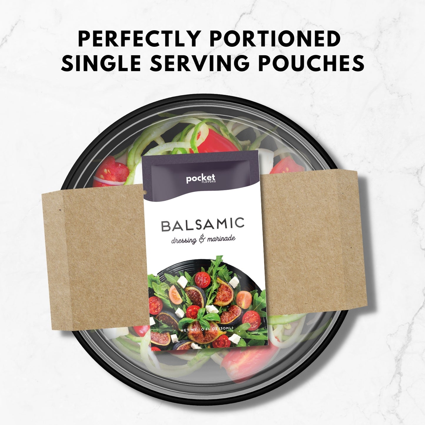 Balsamic single serve salad dressing packet on top of a packaged salad.
