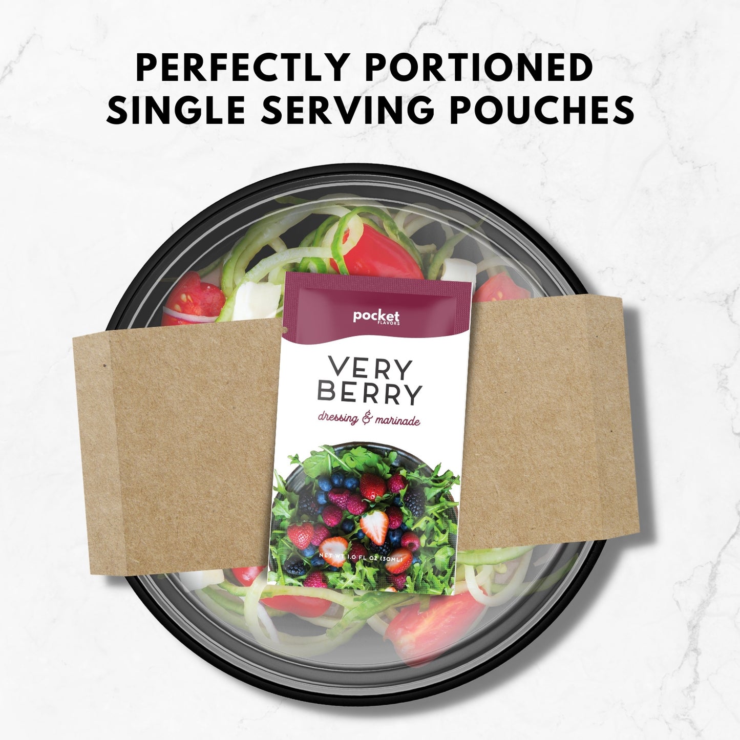 Very berry single serve salad dressing packet on top of a packaged salad.