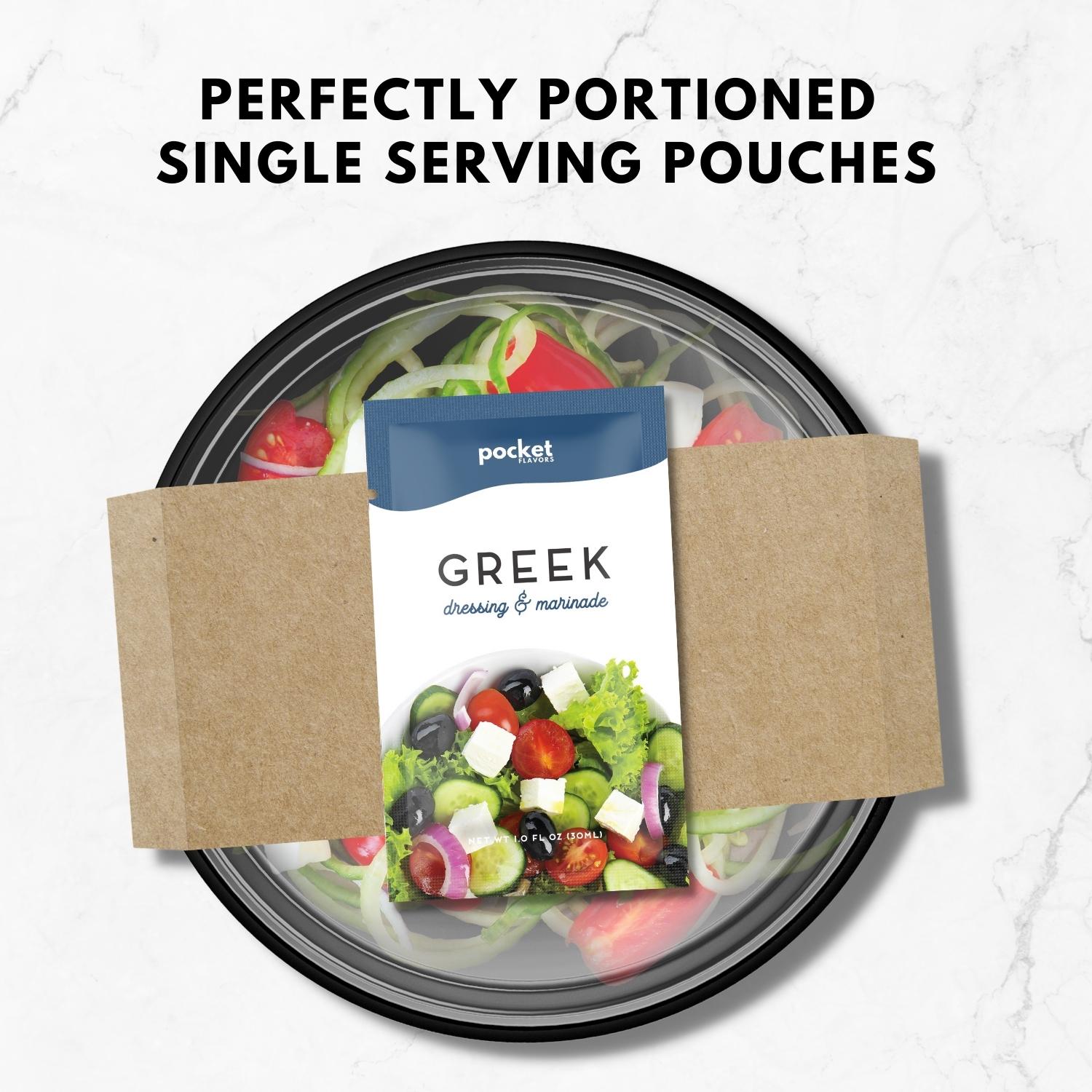 Greek single serve salad dressing packet on top of a packaged salad.